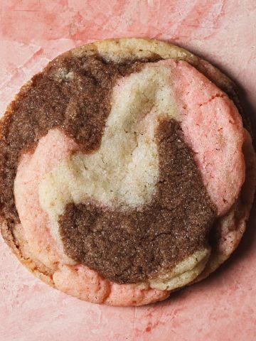 A close-up of a marble peppermint mocha sugar cookie