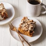 A slice on pumpkin coffee cake on a plate