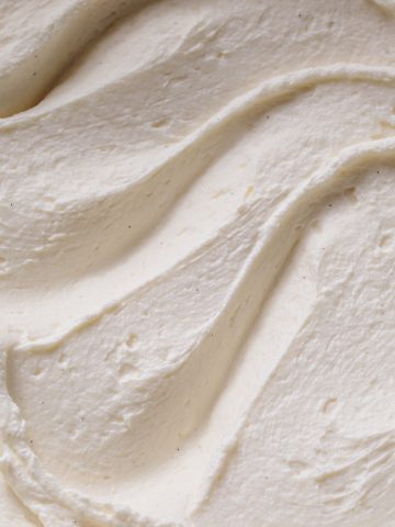 Smooth white chocolate ganache in a bowl