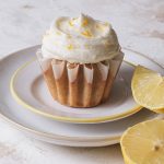 cupcake with lemon cream cheese frosting on top
