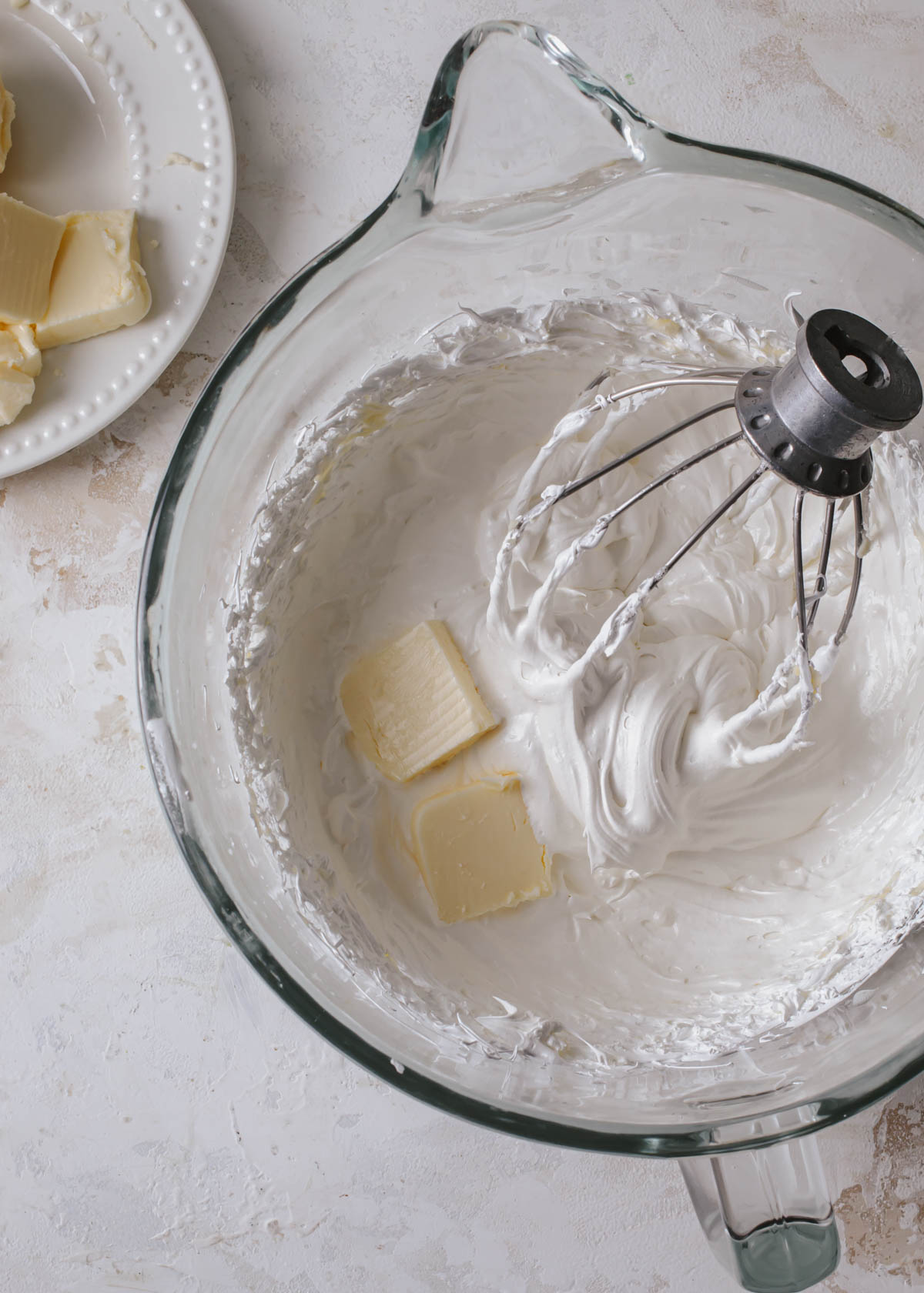 Adding butter to Swiss meringue buttercream